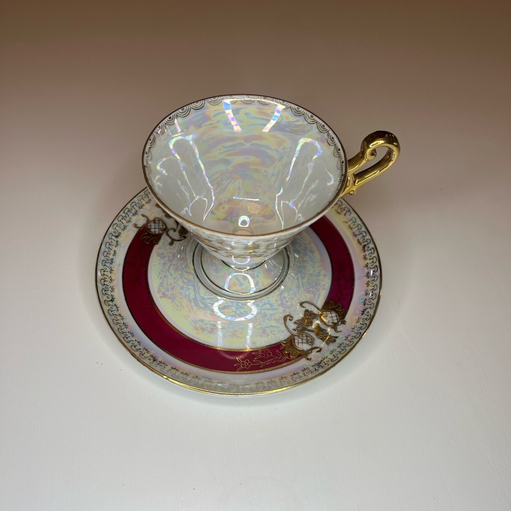 lefton china hand painted tea cup & saucer 
REG. U.S. PAT. Off